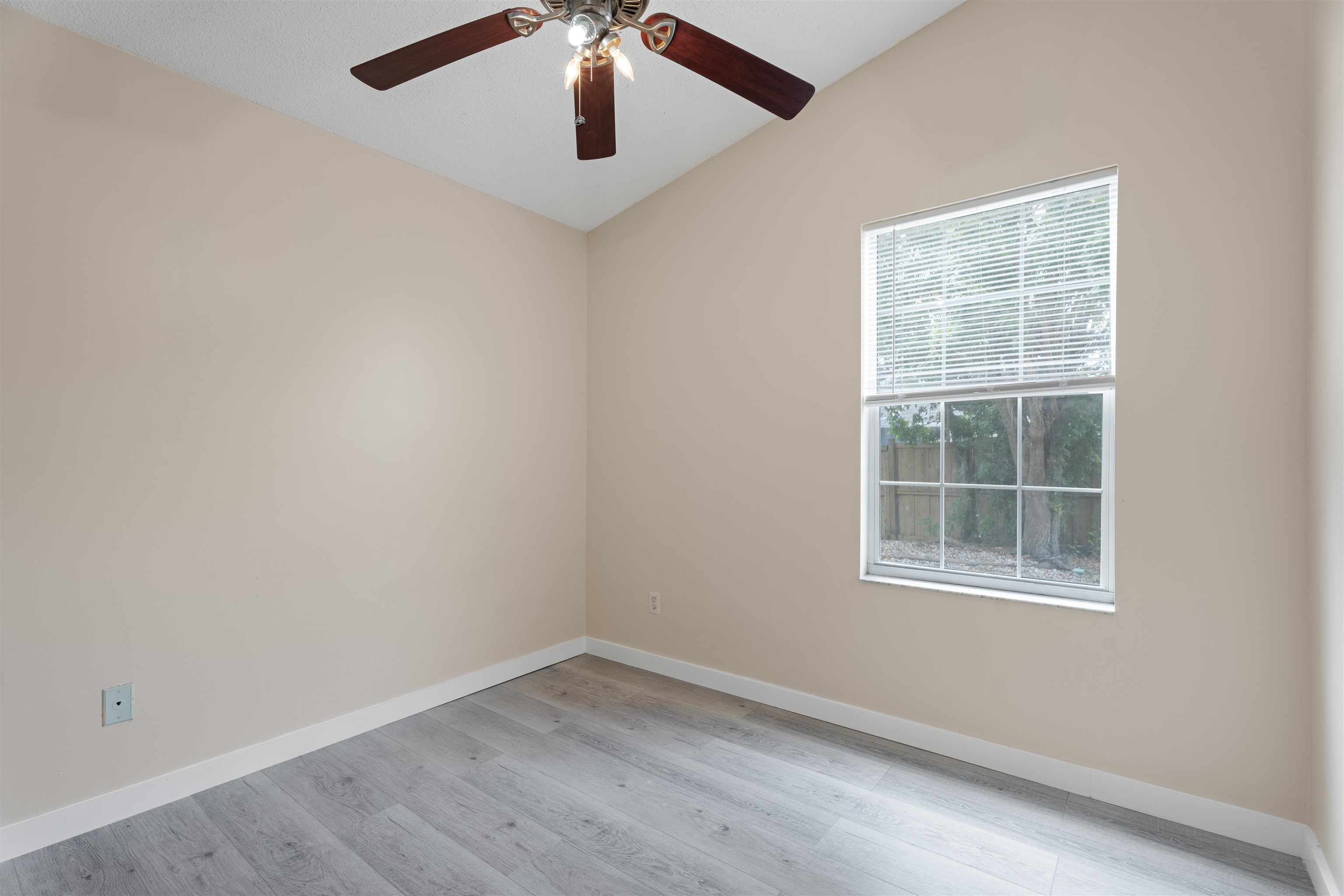 207 B Street St. Augustine Beach, FL 32080 - Photo 9 of 22 an empty room with a window