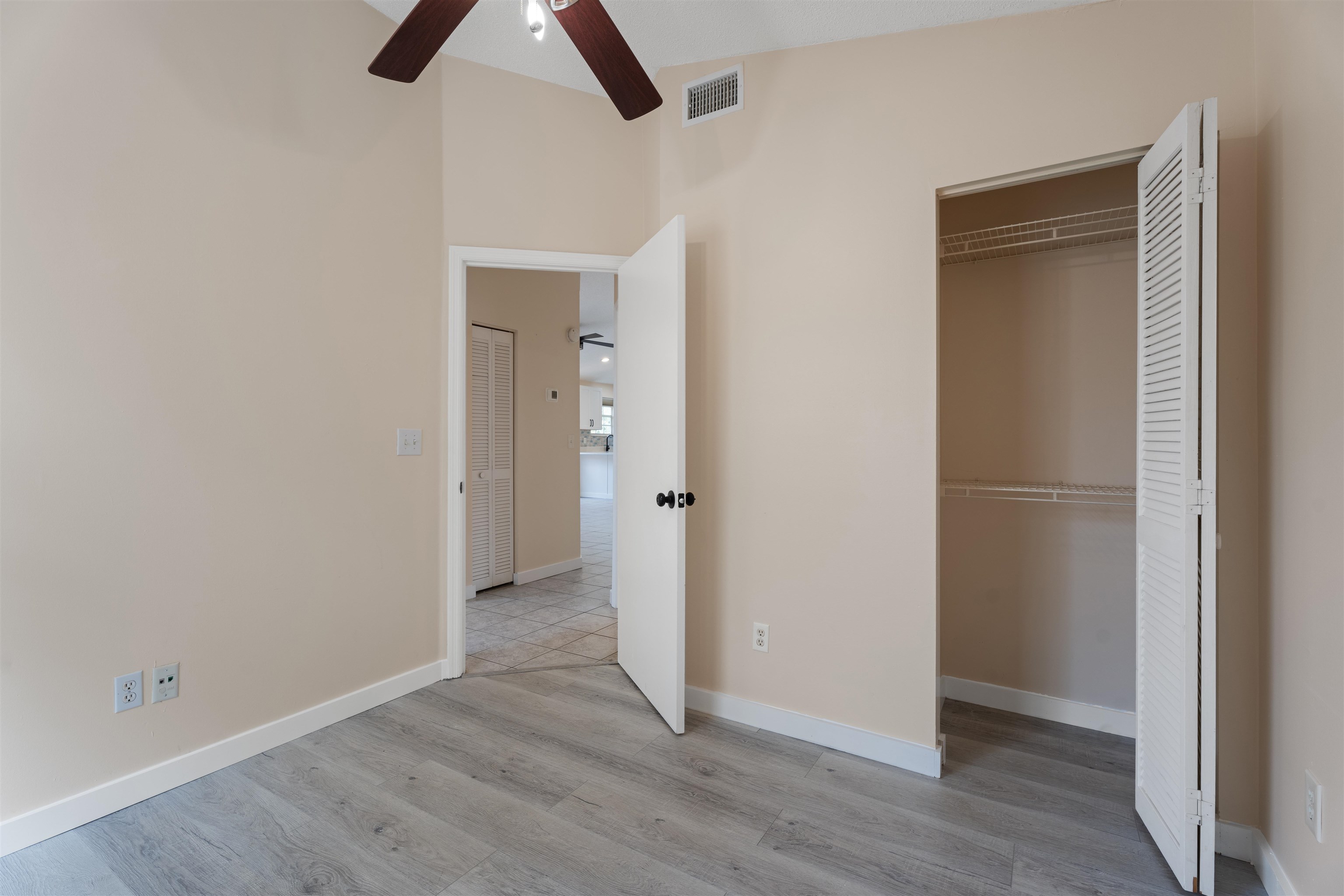 207 B Street St. Augustine Beach, FL 32080 - Photo 10 of 22 an empty room with closet and windows