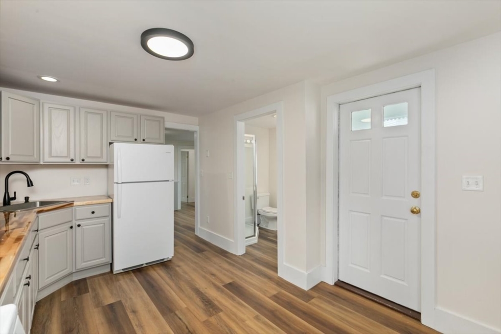 16 Rantoul Street Beverly, MA 01915 - Photo 12 of 34 a view of a kitchen with closet and electronic appliances