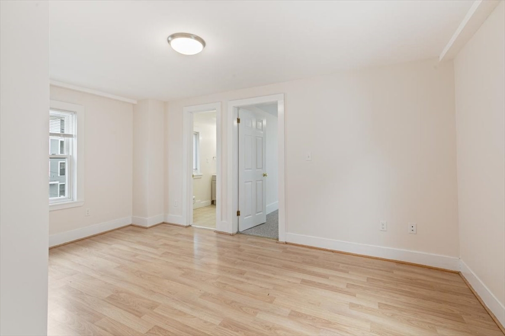 16 Rantoul Street Beverly, MA 01915 - Photo 14 of 34 a view of an empty room with wooden floor