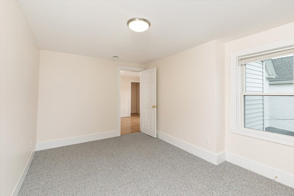 16 Rantoul Street Beverly, MA 01915 - Photo 19 of 34 a view of an empty room with a window