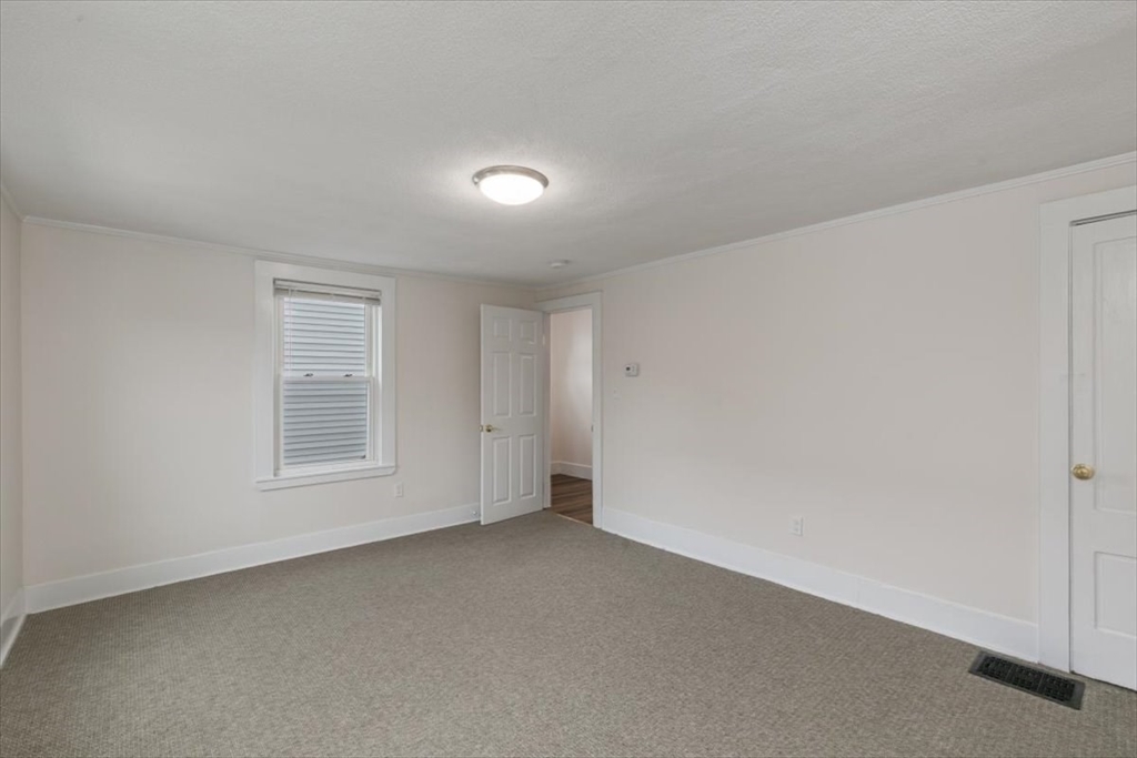 16 Rantoul Street Beverly, MA 01915 - Photo 6 of 34 an empty room with a window