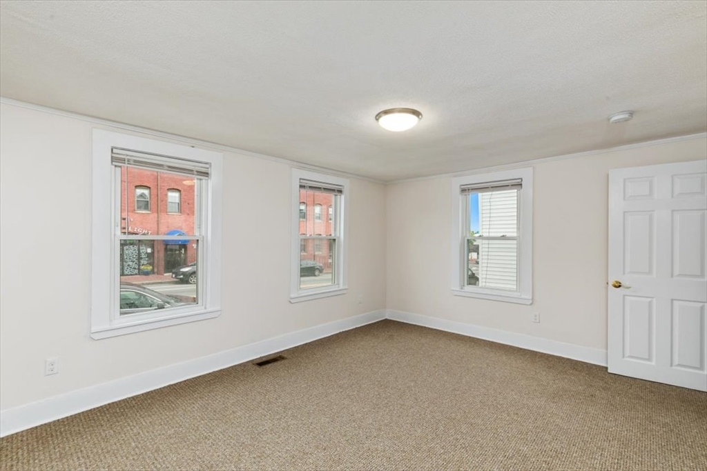 16 Rantoul Street Beverly, MA 01915 - Photo 7 of 34 a view of an empty room with a window