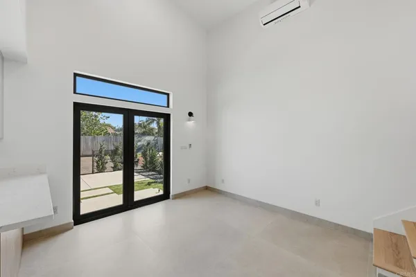 a kitchen with stainless steel appliances a refrigerator sink and stove