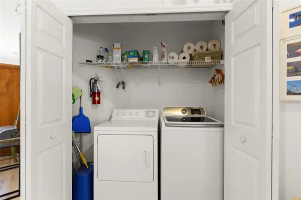 a utility room with dryer and washer