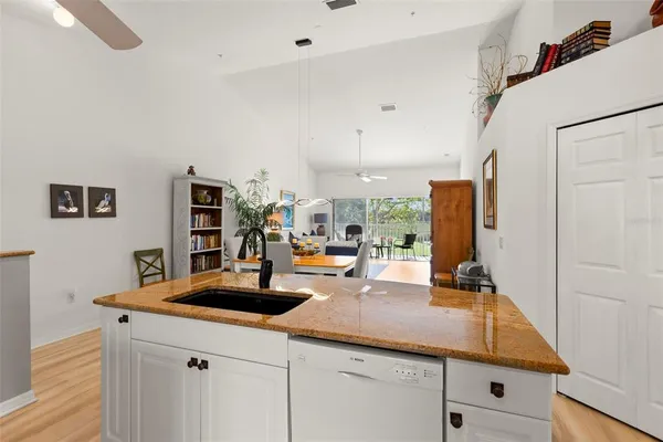 a kitchen with counter top space and stainless steel appliances