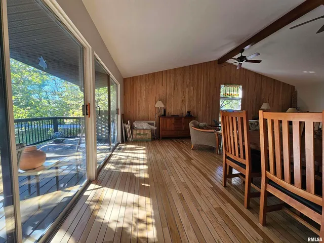 a view of a balcony with chairs