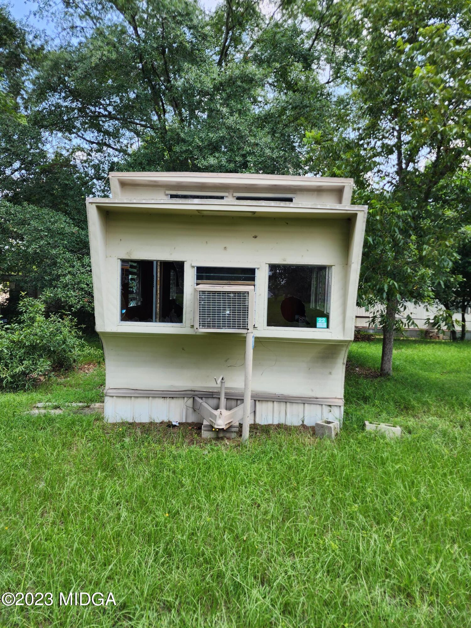 3531 Baker Road Macon, GA 31211 - Photo 12 of 21 a view of a house with backyard and garden