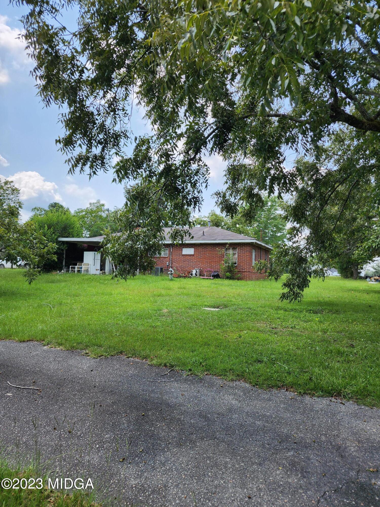 3531 Baker Road Macon, GA 31211 - Photo 2 of 21 a view of backyard with green space