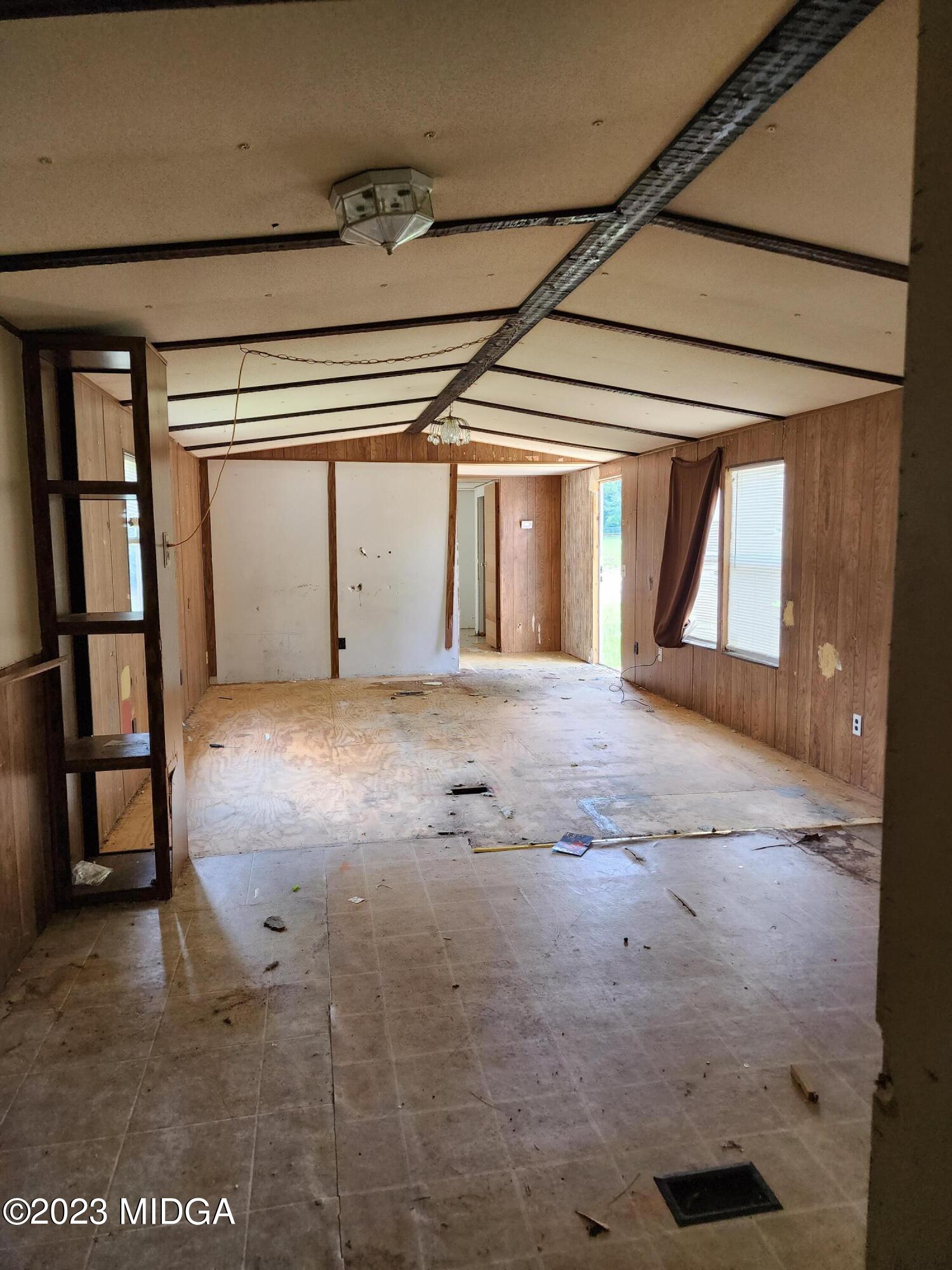 3531 Baker Road Macon, GA 31211 - Photo 4 of 21 a view of empty room with windows