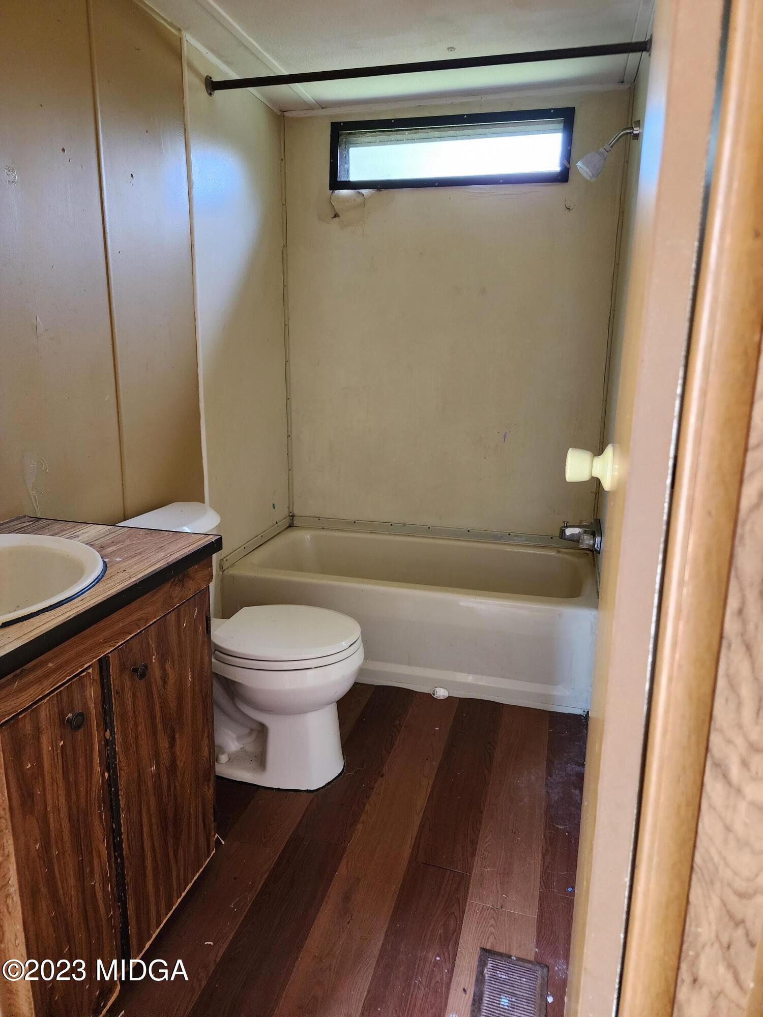3531 Baker Road Macon, GA 31211 - Photo 9 of 21 a bathroom with a toilet and a shower