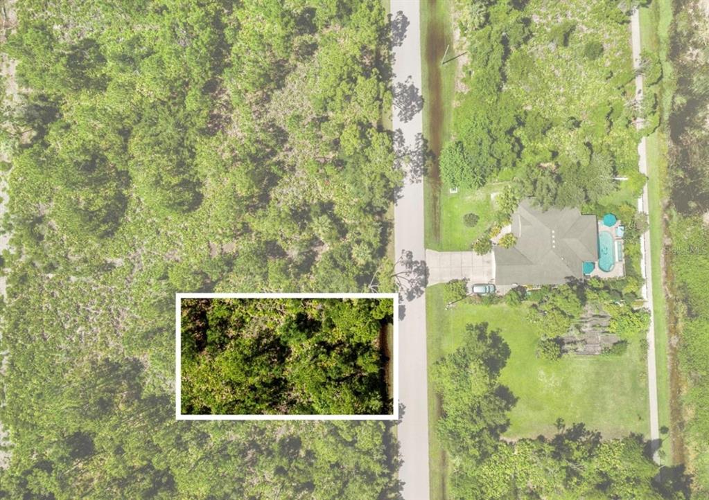 3372 Douglas Road Punta Gorda, FL 33980 - Photo 3 of 4 a view of a garden from a window