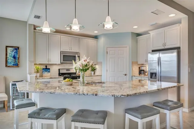 a view of a dining room kitchen and a window