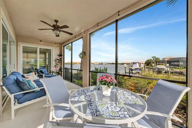 a view of a swimming pool and lounge chair