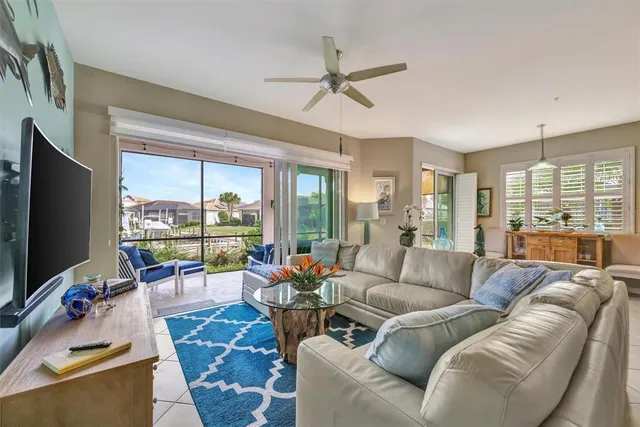 a view of a hallway with paintings on the wall