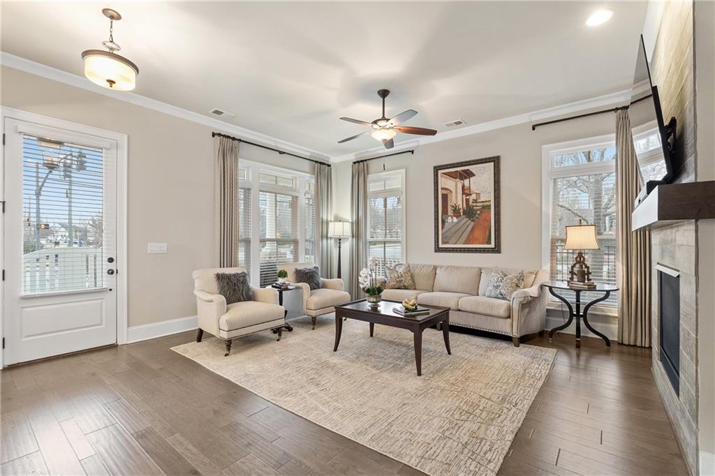 98 Academy Street Alpharetta, GA 30009 - Photo 23 of 56 a living room with furniture and a large window