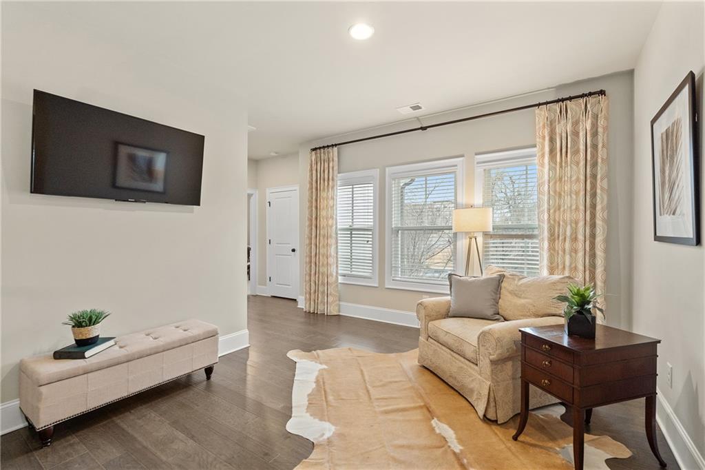 98 Academy Street Alpharetta, GA 30009 - Photo 25 of 56 a living room with furniture and a large window