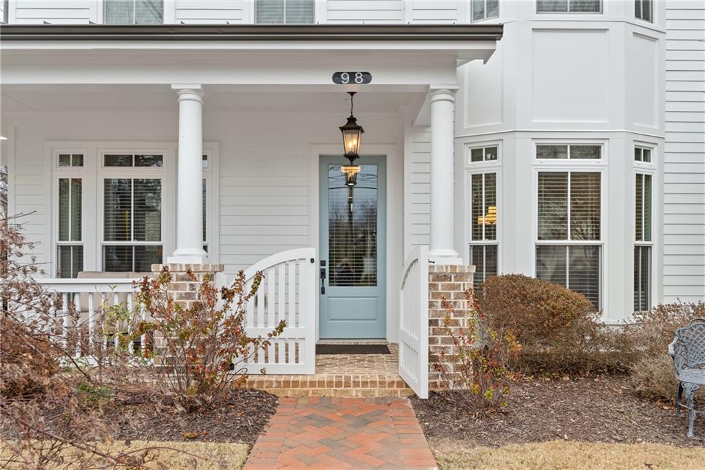 98 Academy Street Alpharetta, GA 30009 - Photo 36 of 56 a front view of a house with a yard