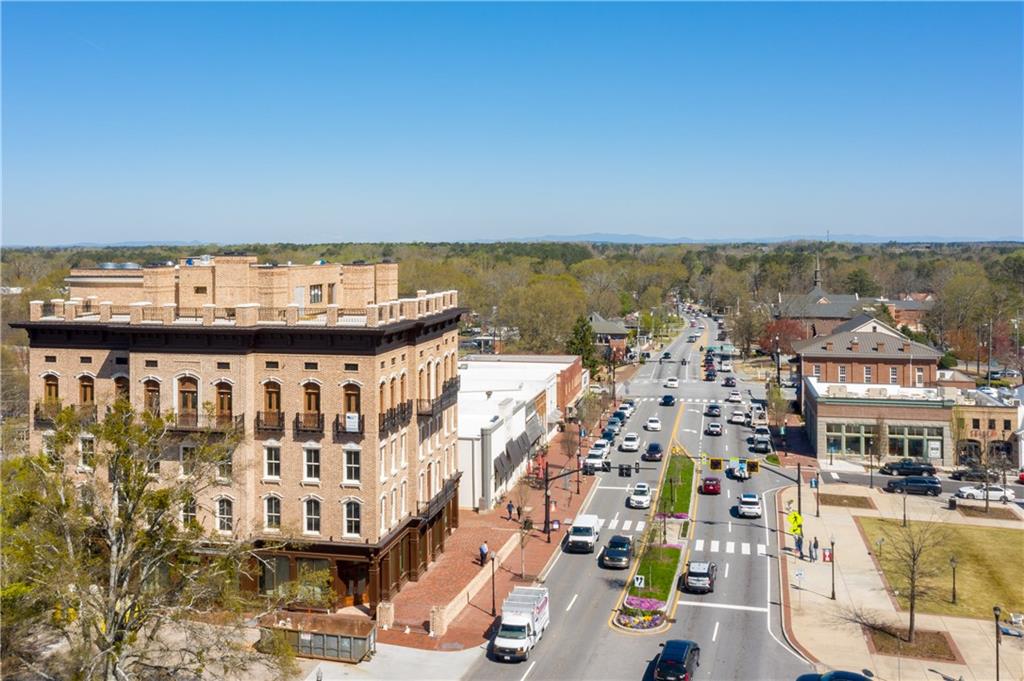 98 Academy Street Alpharetta, GA 30009 - Photo 54 of 56 a view of a city with tall buildings