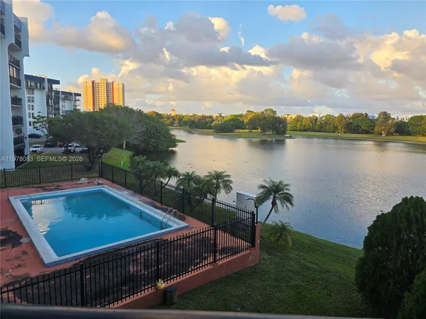 a view of a lake from a balcony