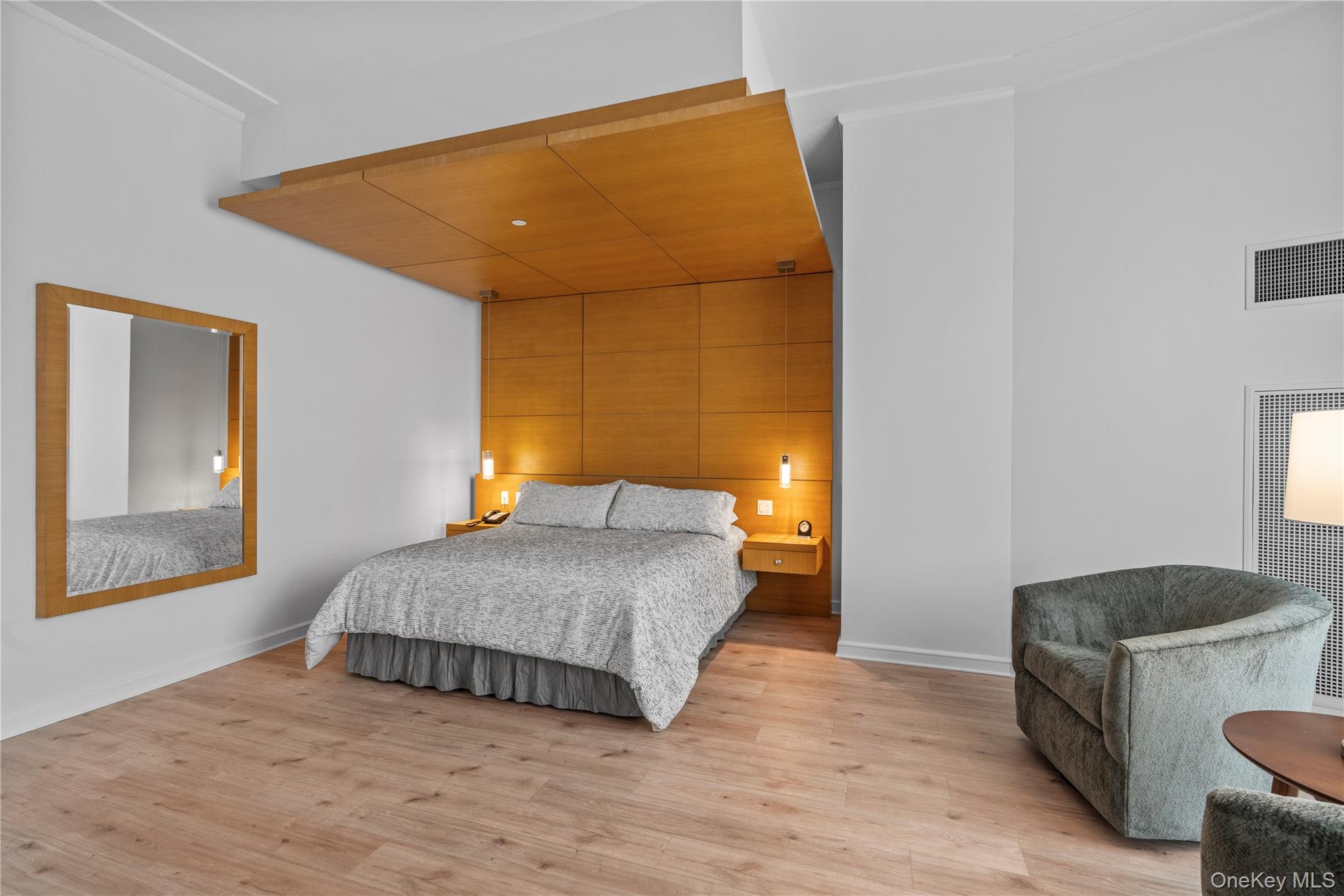 1 Renaissance Square, Unit 10H White Plains, NY 10601 - Photo 7 of 22 a bedroom with a bed and window