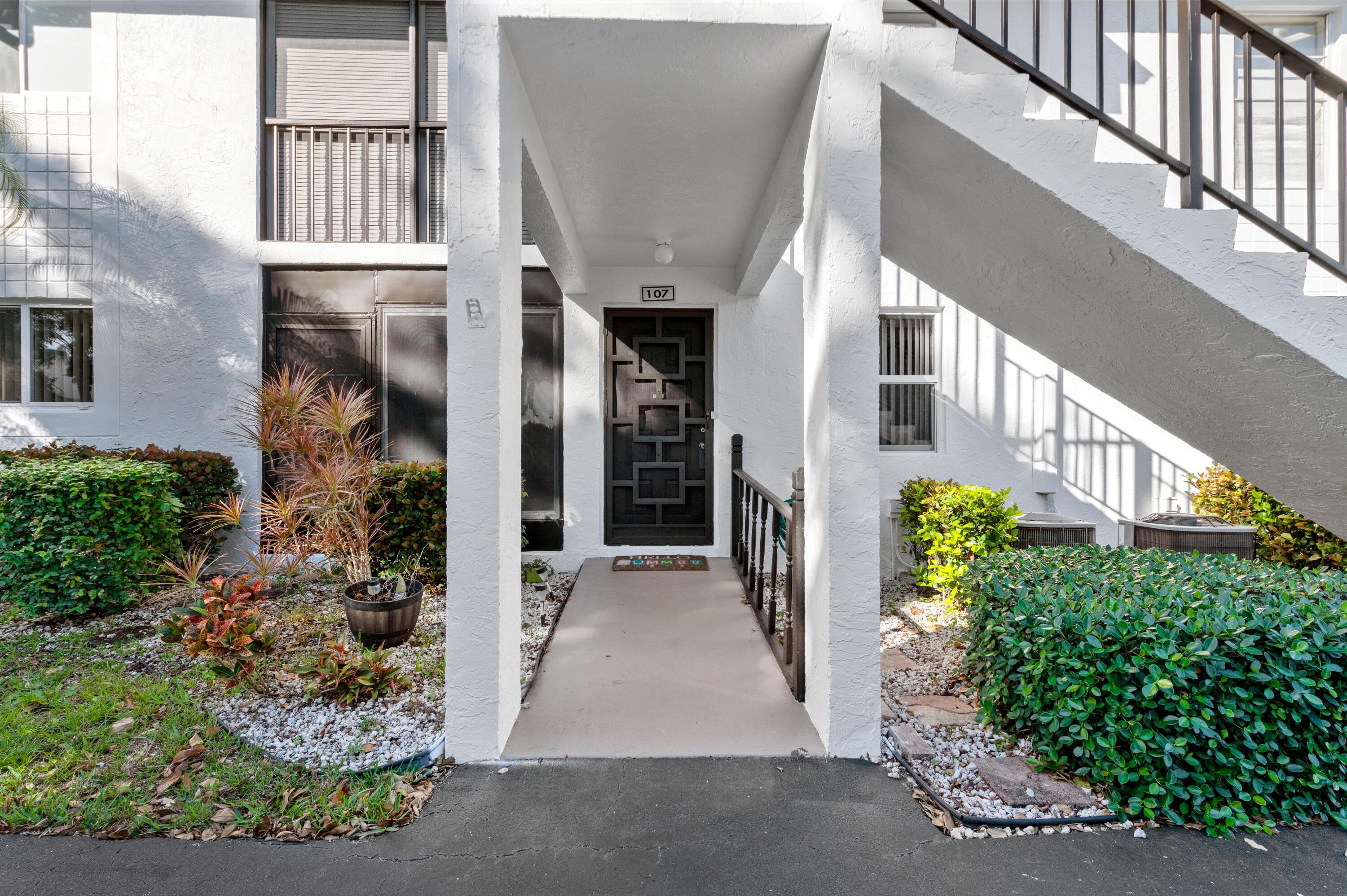 14895 Builtmore Way, Unit 107 Delray Beach, FL 33446 - Photo 2 of 40 a view of a entryway of the house