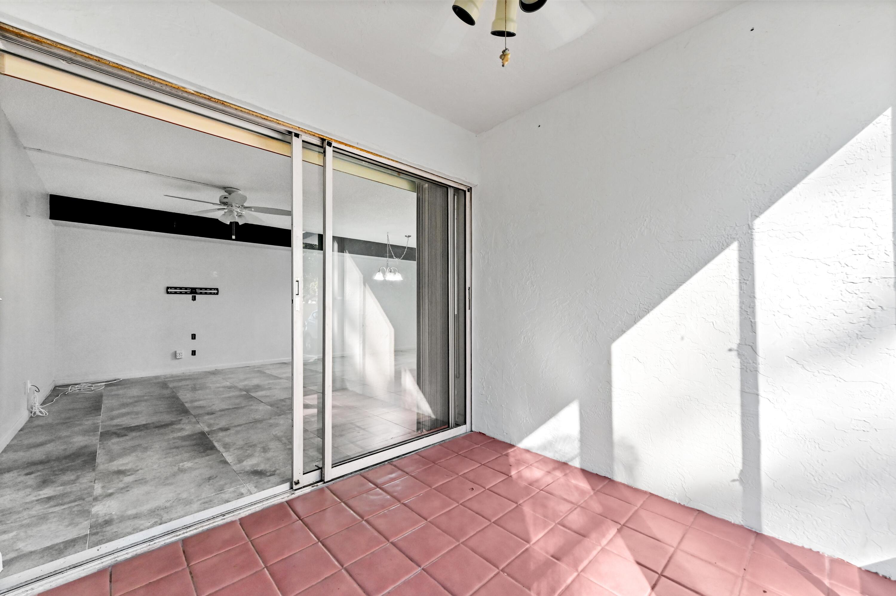 14895 Builtmore Way, Unit 107 Delray Beach, FL 33446 - Photo 23 of 40 a view of an empty room
