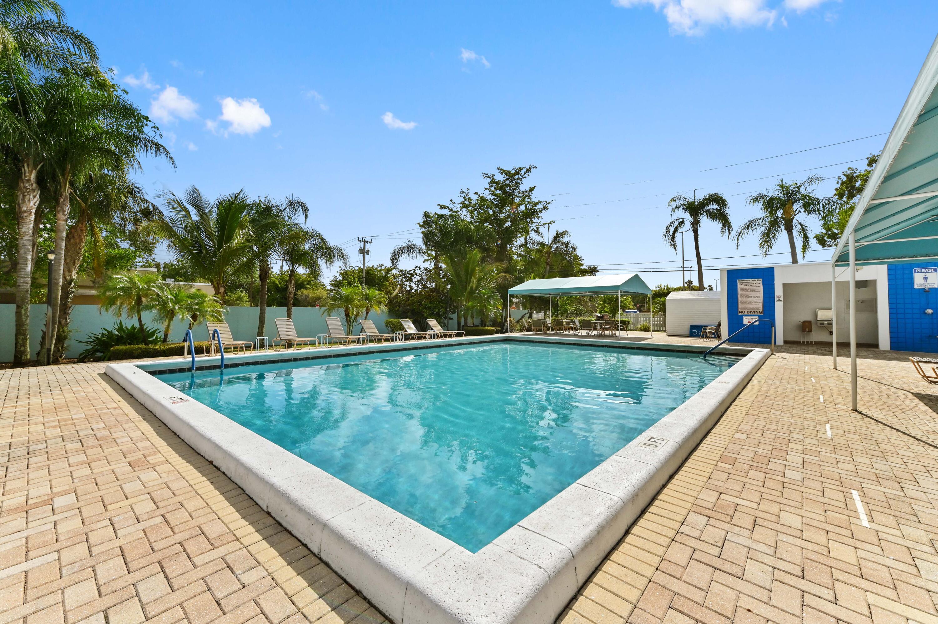 14895 Builtmore Way, Unit 107 Delray Beach, FL 33446 - Photo 25 of 40 a view of swimming pool
