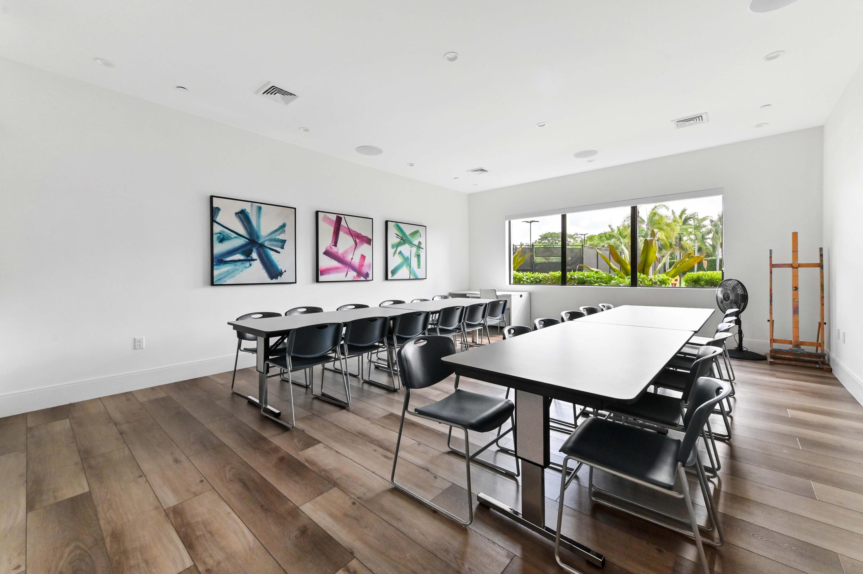 14895 Builtmore Way, Unit 107 Delray Beach, FL 33446 - Photo 31 of 40 a view of a dining room with furniture window and wooden floor