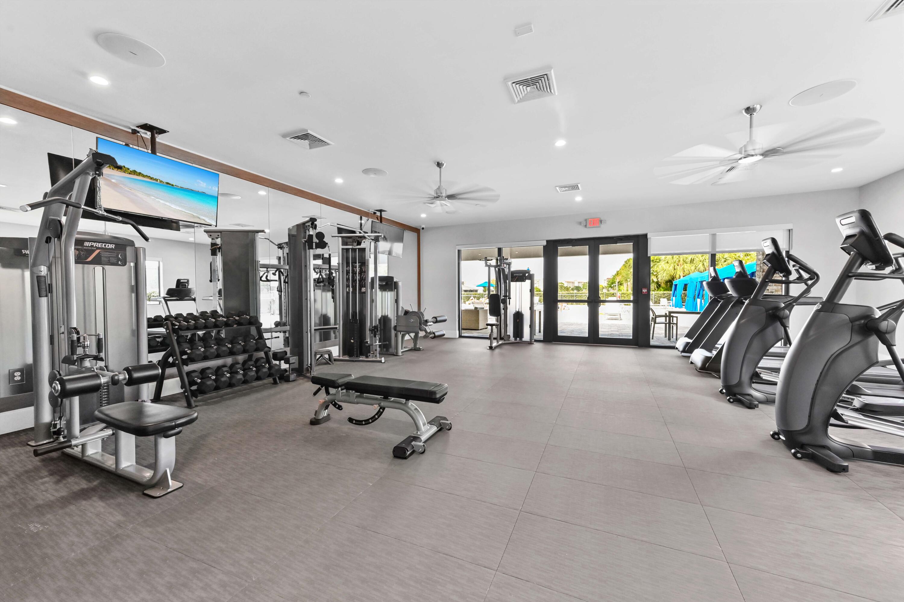 14895 Builtmore Way, Unit 107 Delray Beach, FL 33446 - Photo 32 of 40 a view of a room with gym equipment