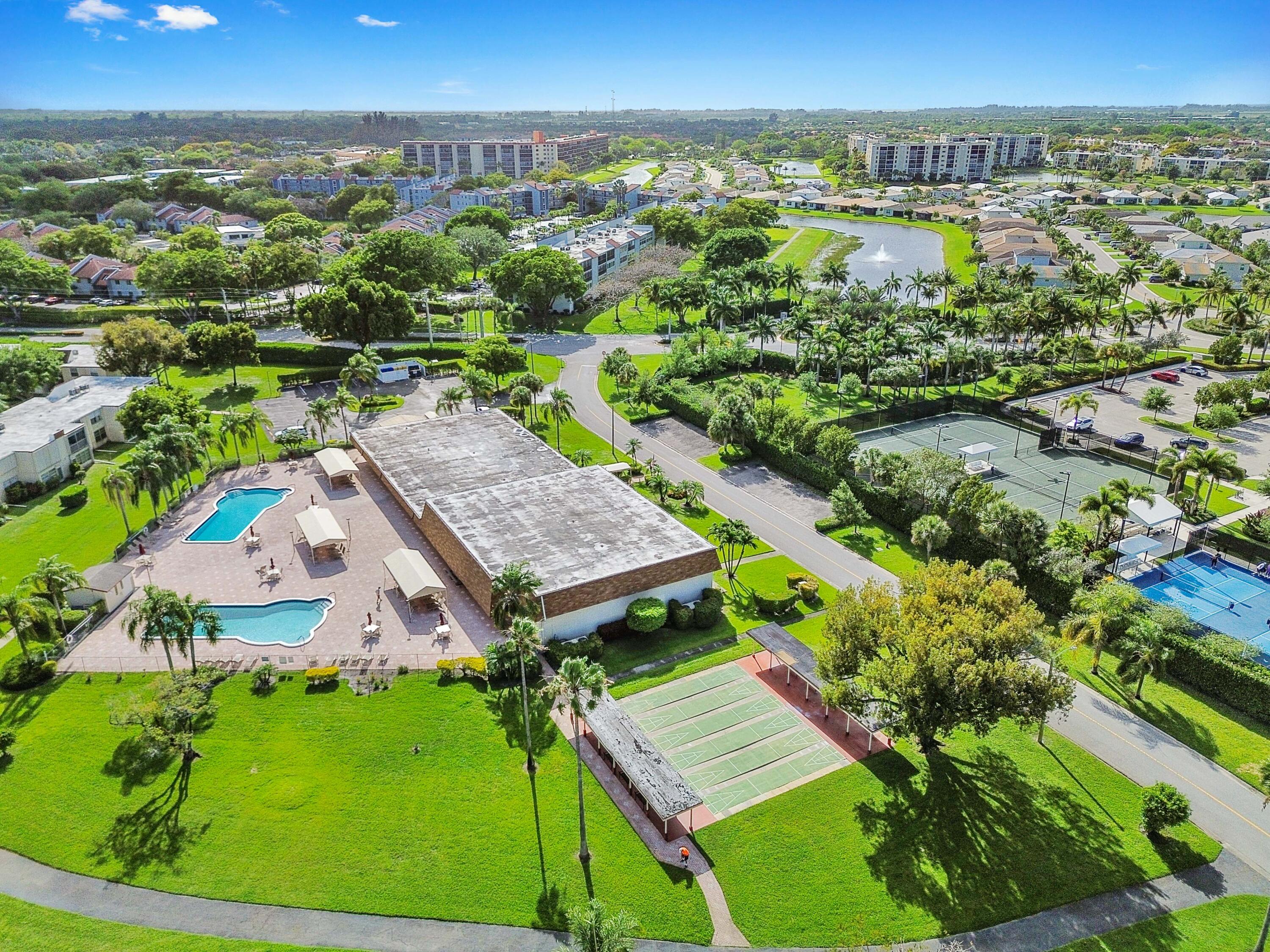 14895 Builtmore Way, Unit 107 Delray Beach, FL 33446 - Photo 38 of 40 an aerial view of a house with a garden