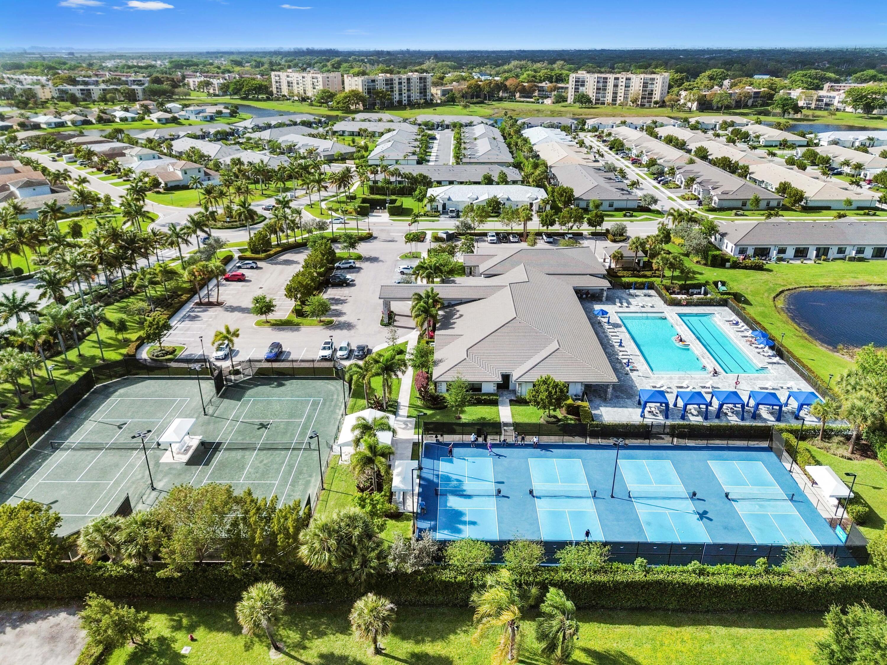 14895 Builtmore Way, Unit 107 Delray Beach, FL 33446 - Photo 40 of 40 an aerial view of residential houses with outdoor space