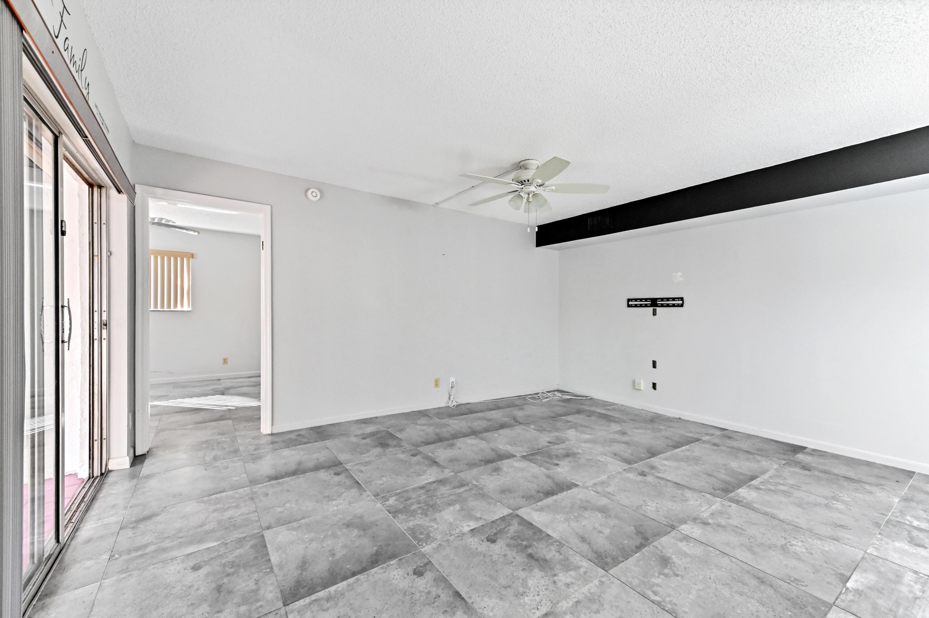 14895 Builtmore Way, Unit 107 Delray Beach, FL 33446 - Photo 10 of 40 a view of an empty room