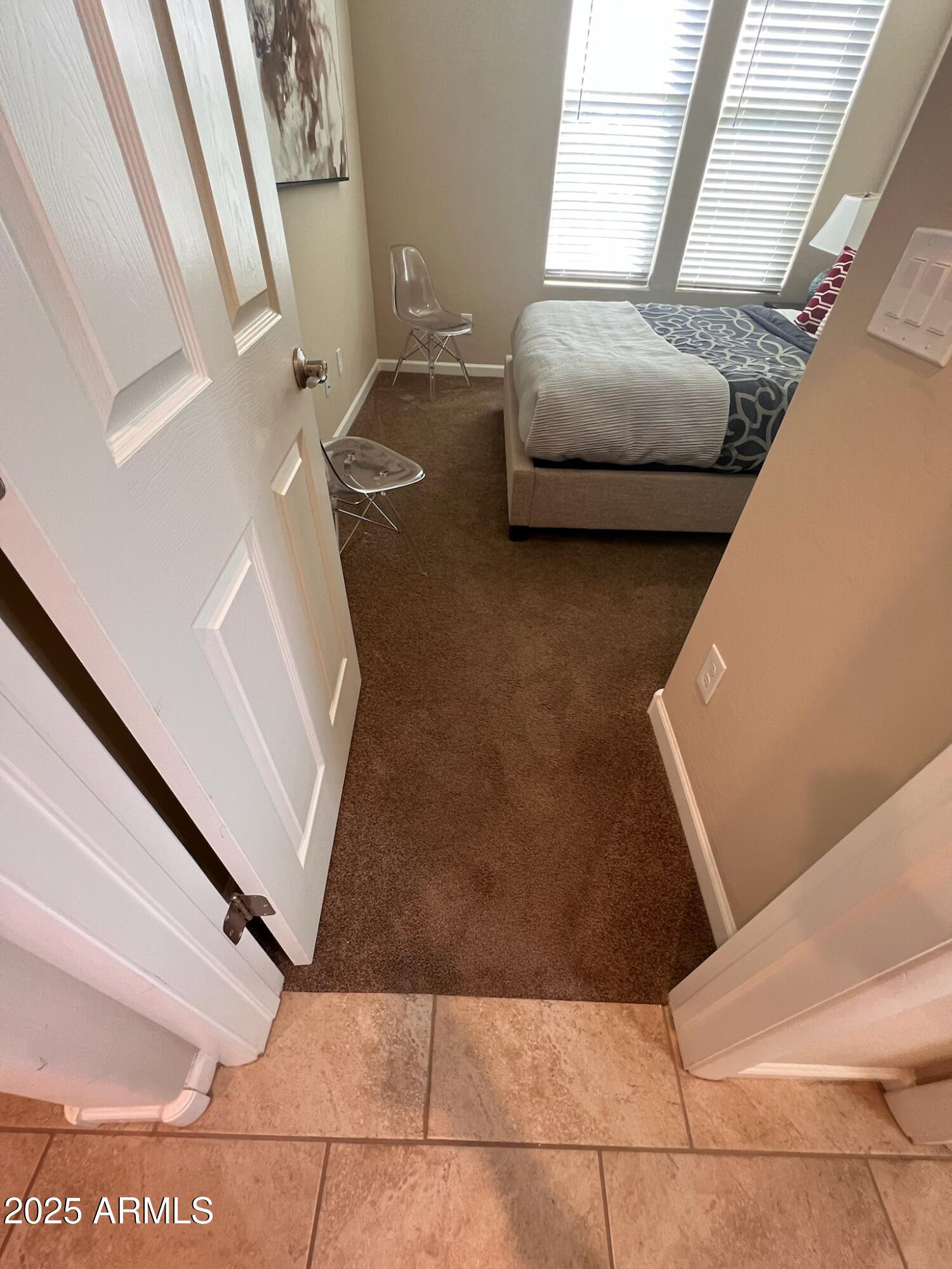 29316 North Lone Pine Lane Rio Verde, AZ 85263 - Photo 16 of 53 a living room with furniture and a floor to ceiling window