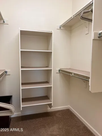 a view of an empty walk in closet