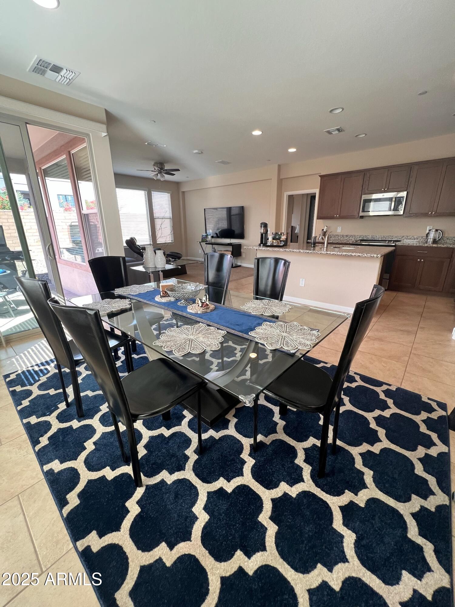 29316 North Lone Pine Lane Rio Verde, AZ 85263 - Photo 46 of 53 a view of a dining table and chairs in a room