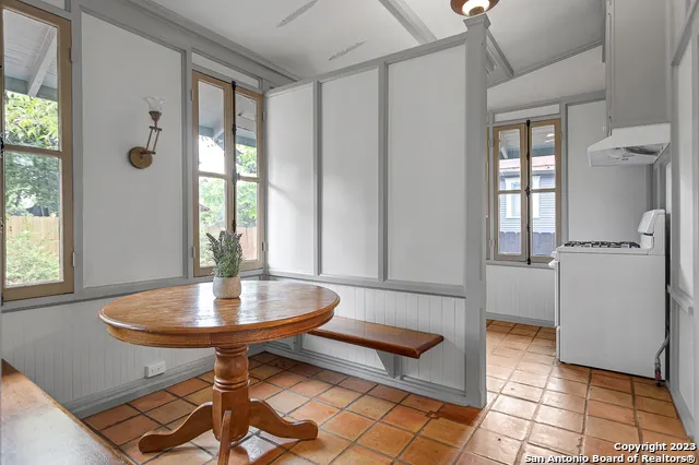 a living room with a couch and a table