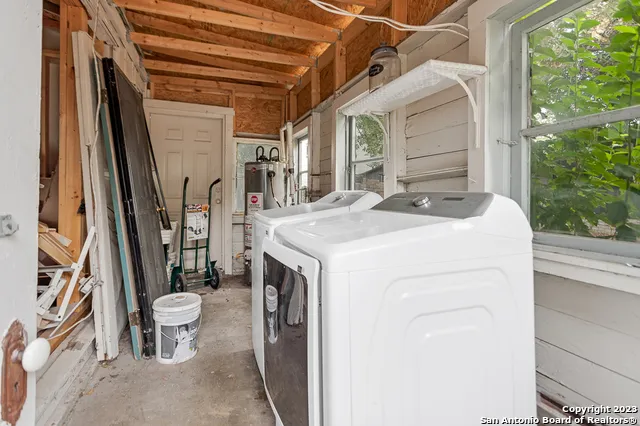 a utility room with dryer and washer