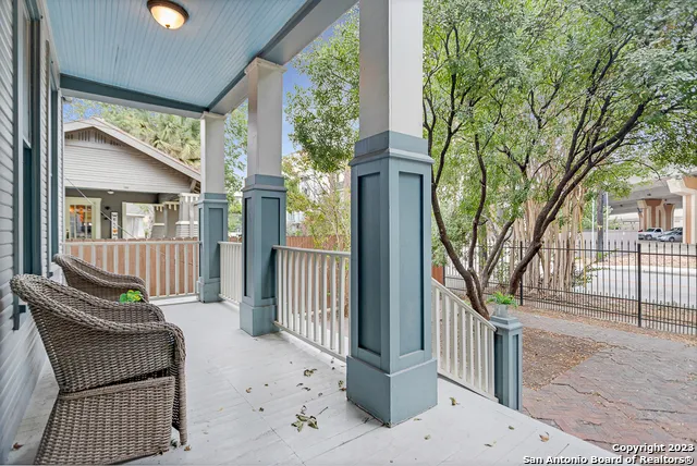 a view of balcony with furniture