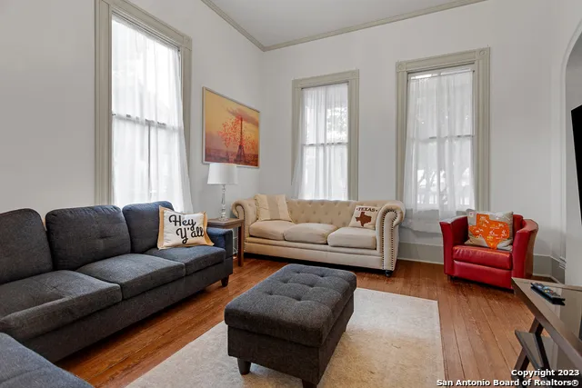 a living room with furniture and a window