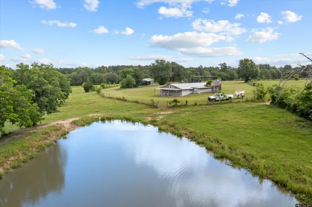 a view of a lake from a yard