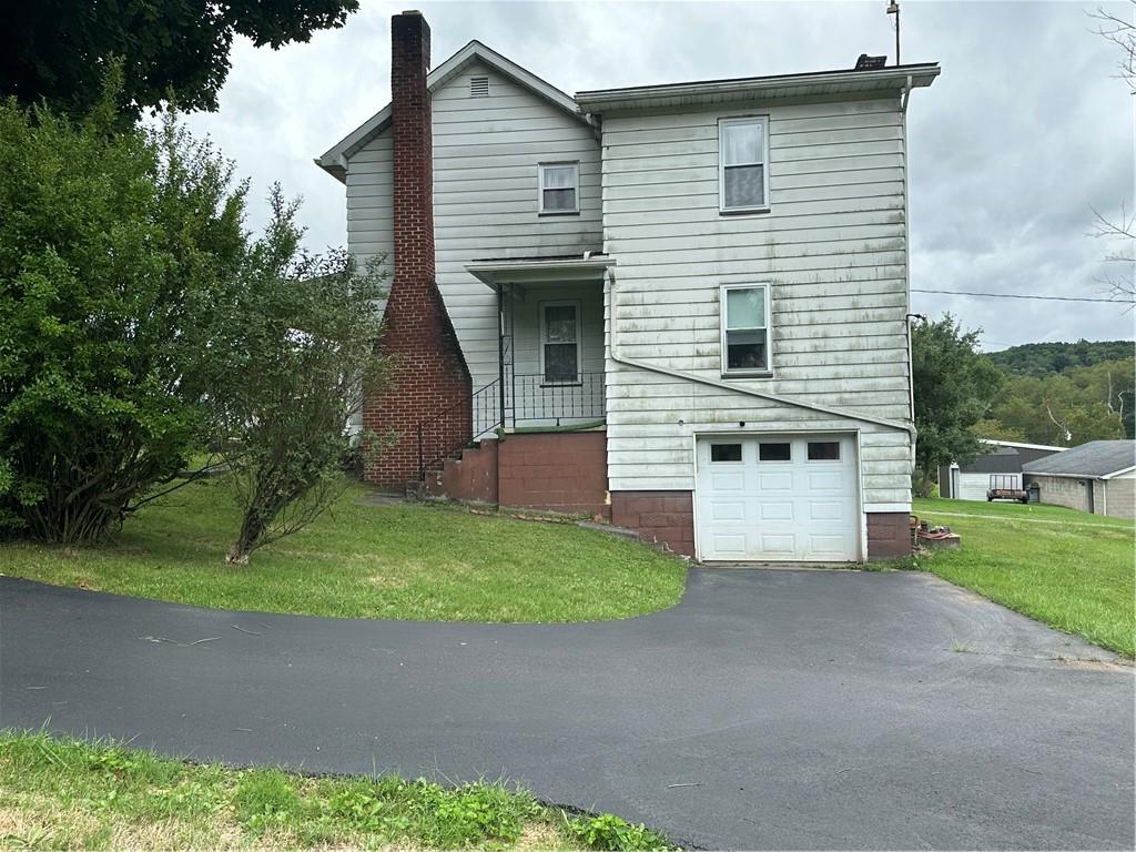 901 Clearfield Road Fenelton, PA 16034 - Photo 3 of 29 side of structure showing integral garage door