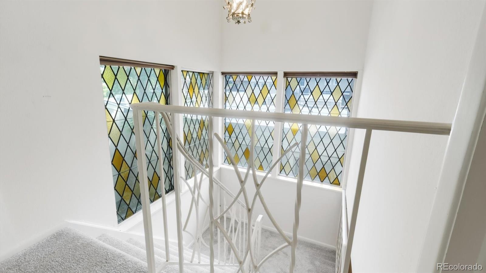 3292 South Oneida Way Denver, CO 80224 - Photo 20 of 44 a view of entryway with wooden floor