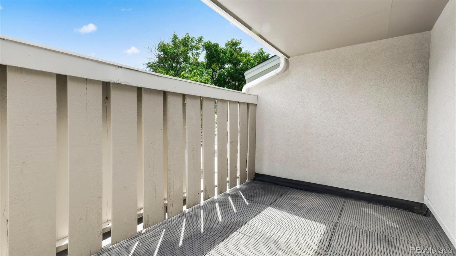 3292 South Oneida Way Denver, CO 80224 - Photo 25 of 44 a view of wooden floor in a room