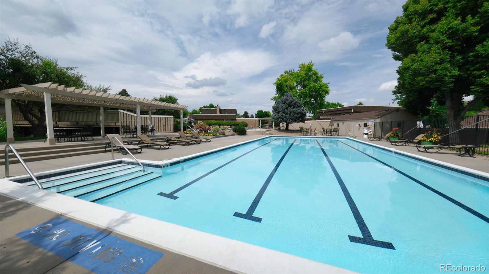 3292 South Oneida Way Denver, CO 80224 - Photo 36 of 44 a view of a swimming pool with a patio