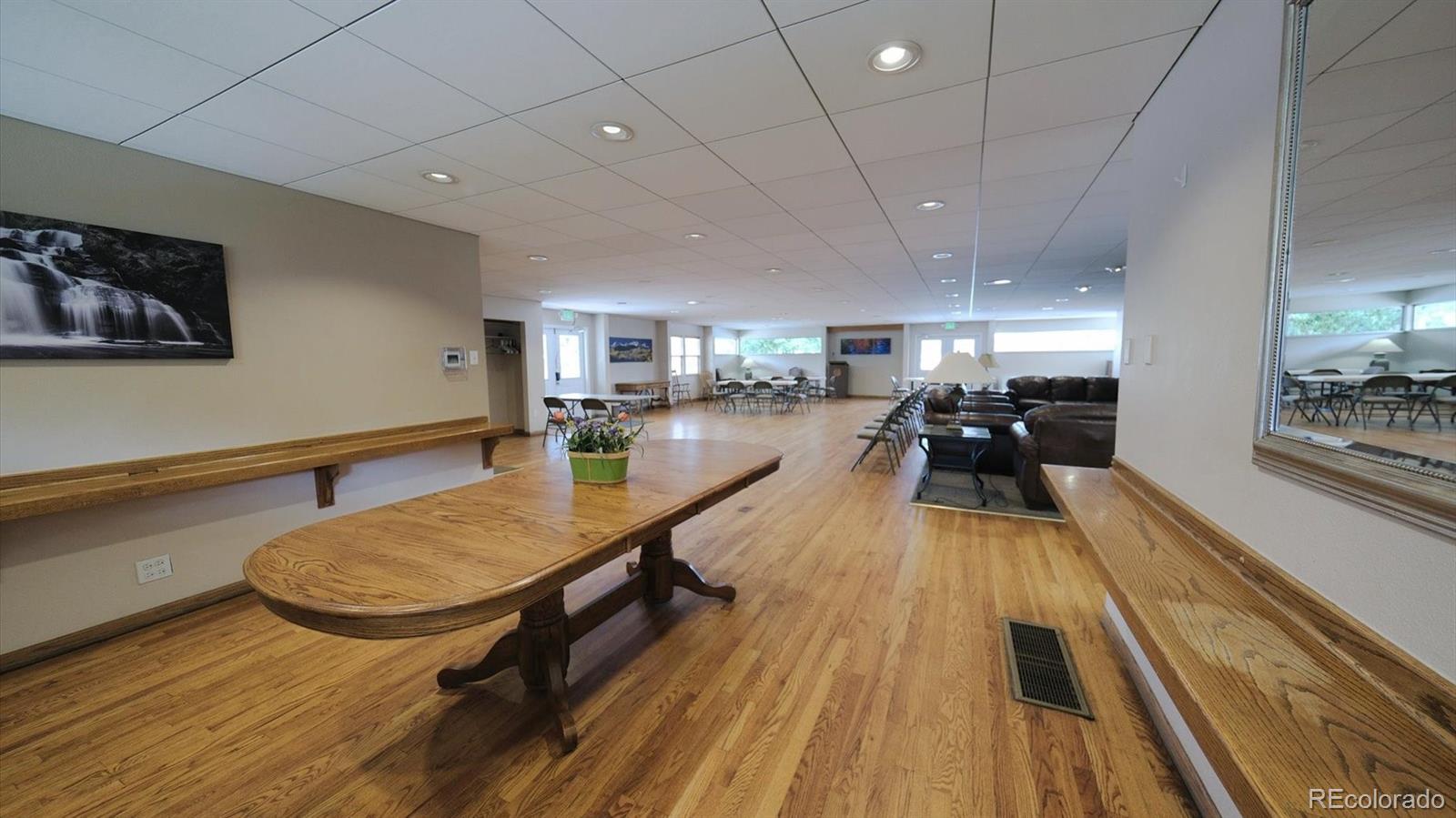 3292 South Oneida Way Denver, CO 80224 - Photo 40 of 44 a view of a dining room with furniture