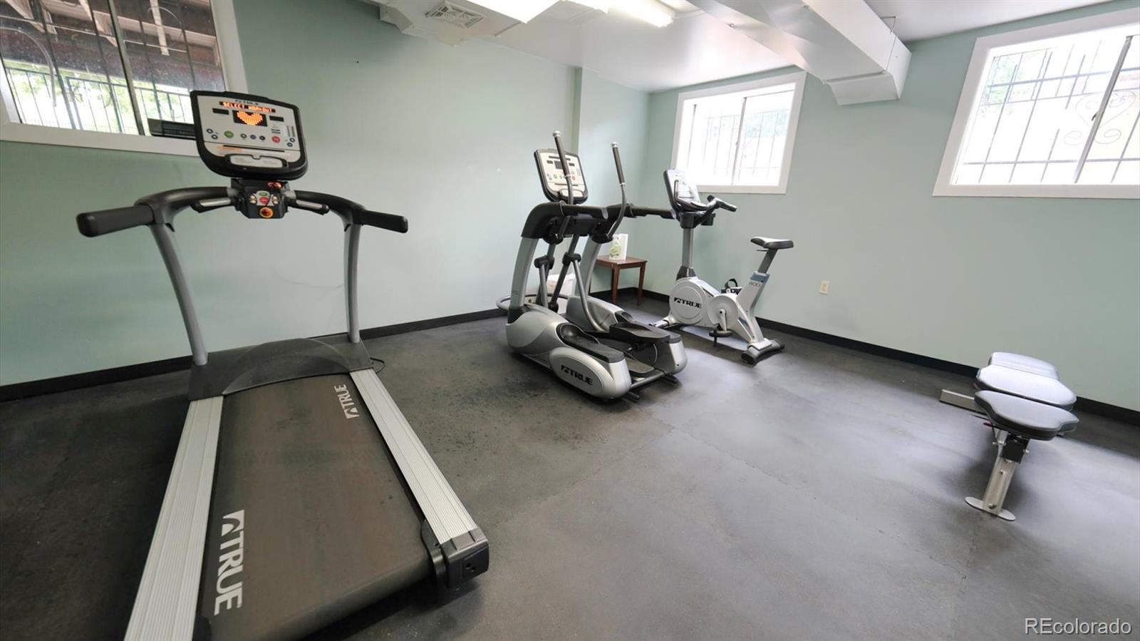 3292 South Oneida Way Denver, CO 80224 - Photo 41 of 44 a room with gym equipment