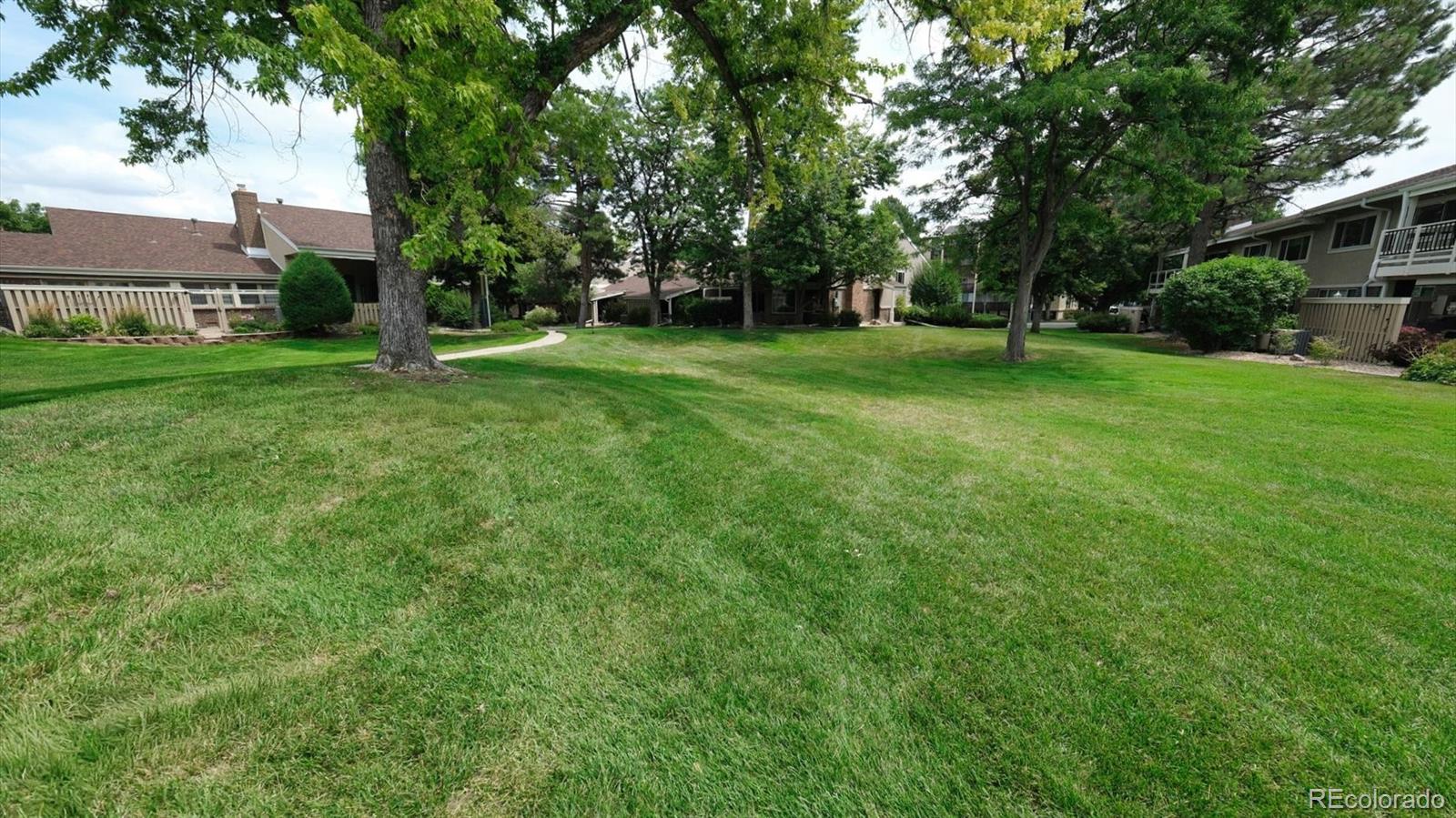 3292 South Oneida Way Denver, CO 80224 - Photo 43 of 44 a view of a house with a backyard