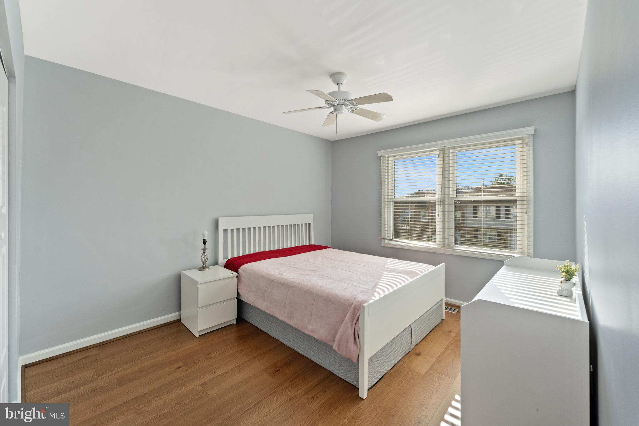 11 Briarstone Lane Gaithersburg, MD 20877 - Photo 14 of 31 a bedroom with a bed and window