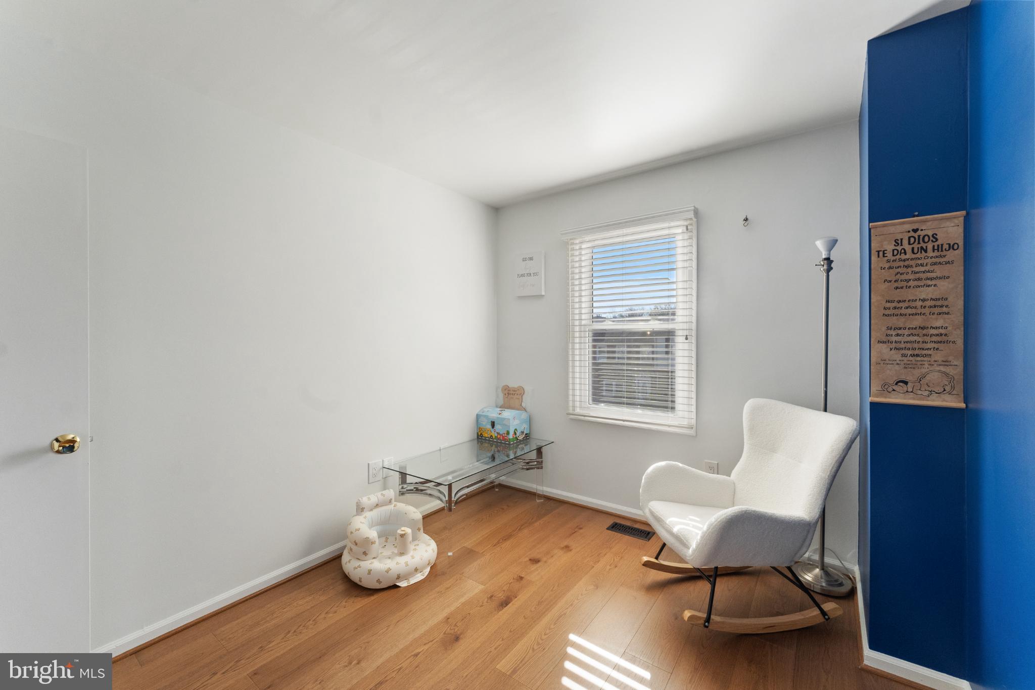 11 Briarstone Lane Gaithersburg, MD 20877 - Photo 19 of 31 a living room with furniture and wooden floor